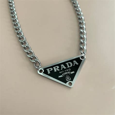 prada triangle charm|prada chin necklace.